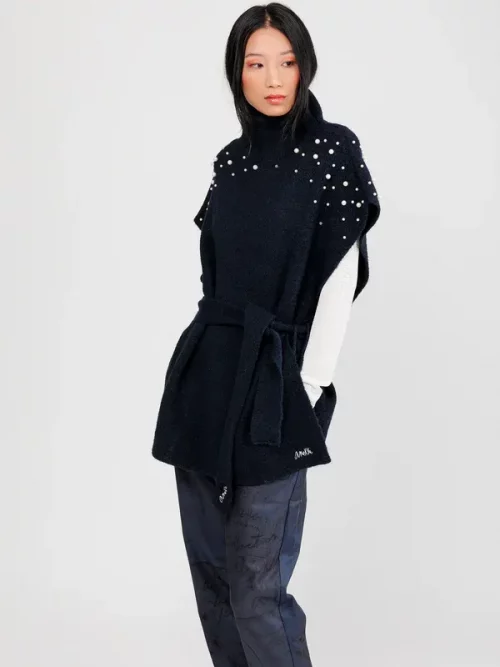 Poncho cuello alto con cinturón azul